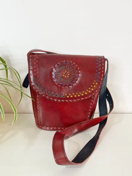 Handcrafted Kutchi leather Bucket shaped Sling Bag with Cutwork