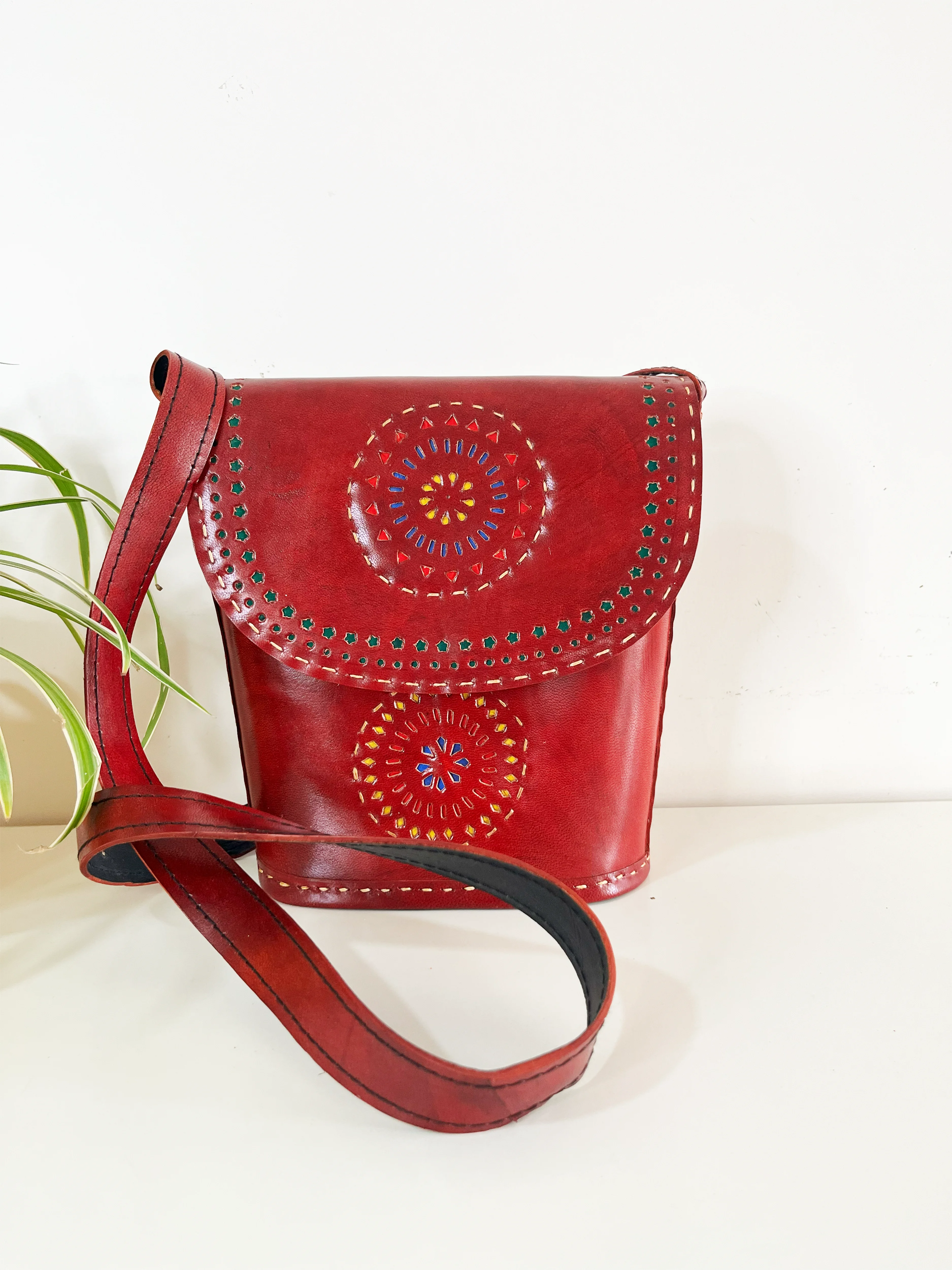 Handcrafted Kutchi leather Bucket shaped Sling Bag with Cutwork