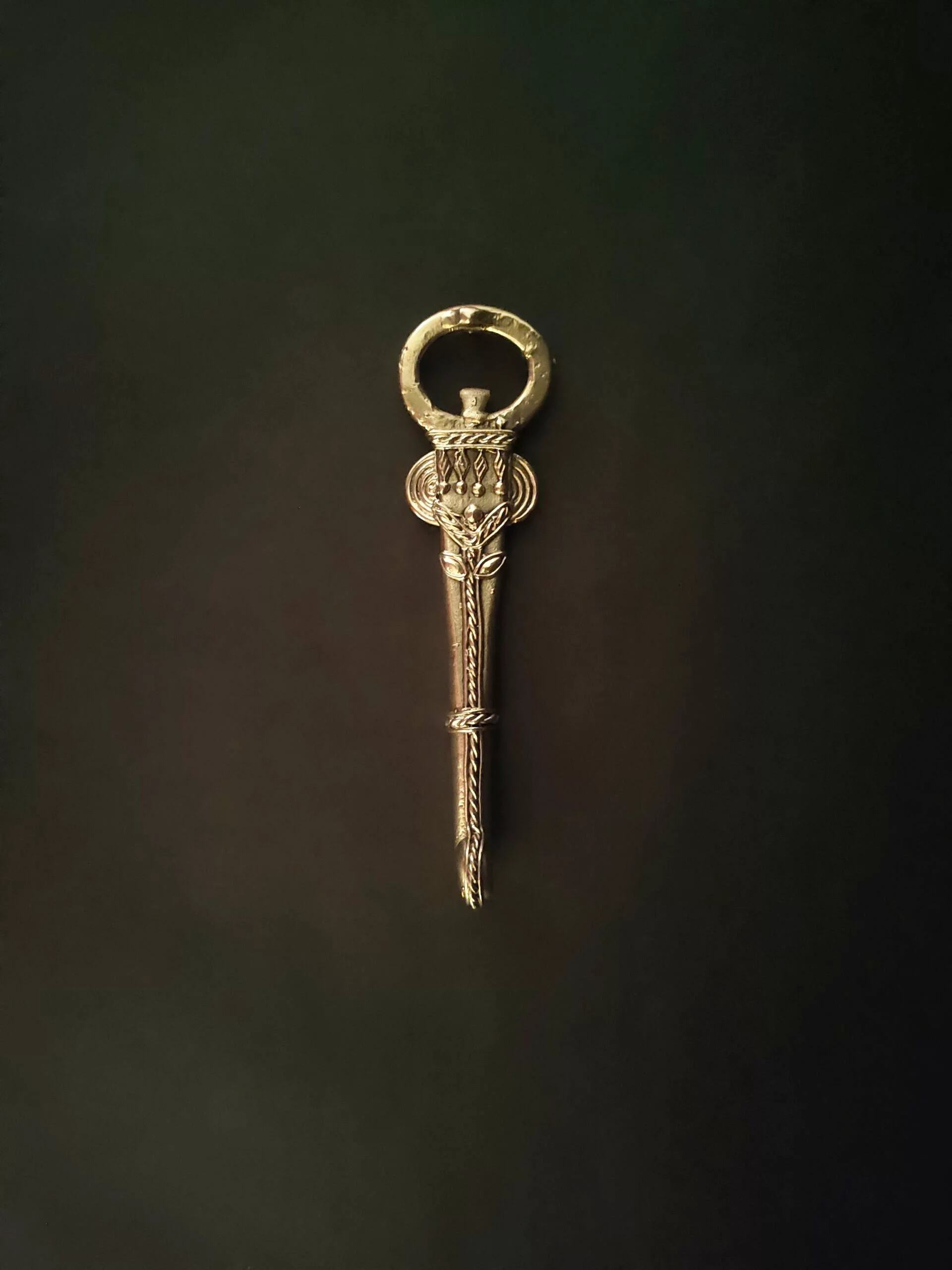 Handcrafted Dhokra Elephant trunk-shaped Bottle Opener